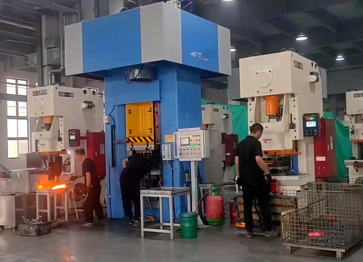 Electric Screw Press in Workshop - Industrial Metal Forging Machine Operating in Factory Environment